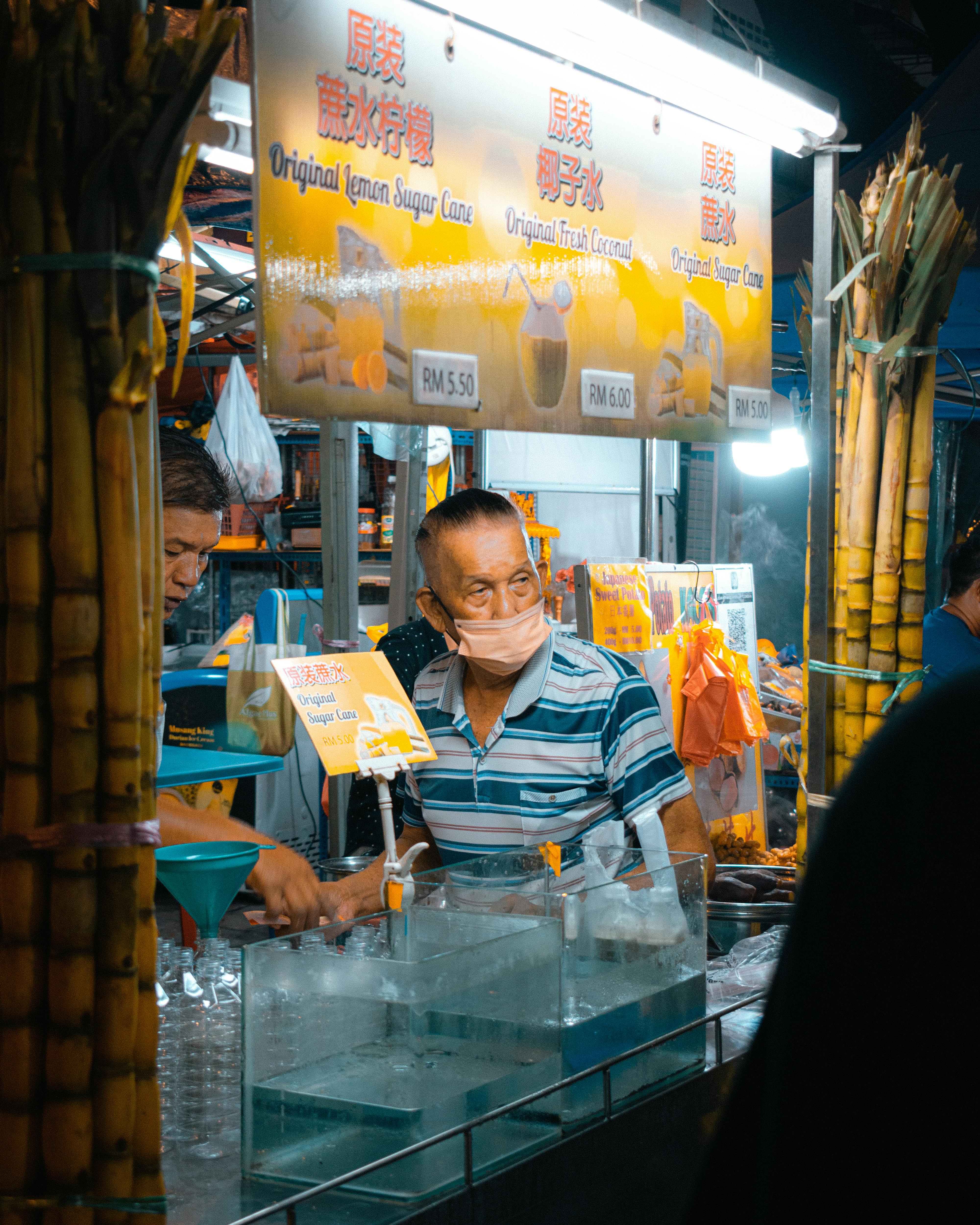 Street food market scene in Malaysia.