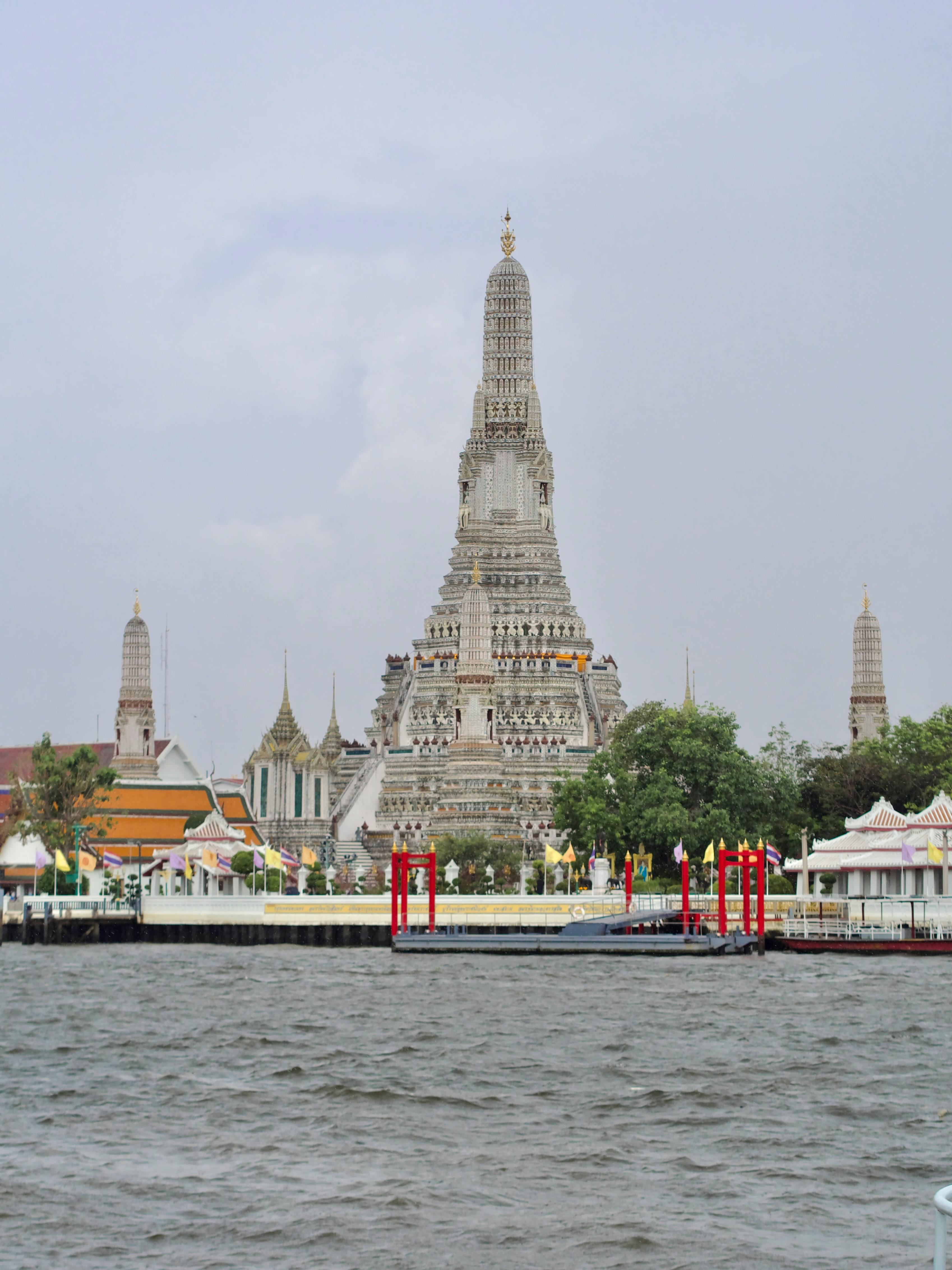 Wat Arun temple on the river in Bangkok, Thailand.